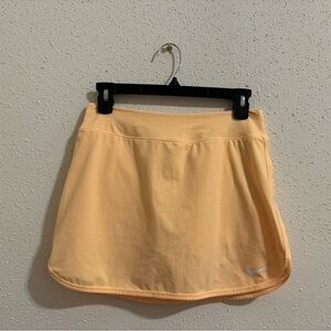 Nike Dri-Fit Monogram Tennis Skort in Yellow Peach - Size S